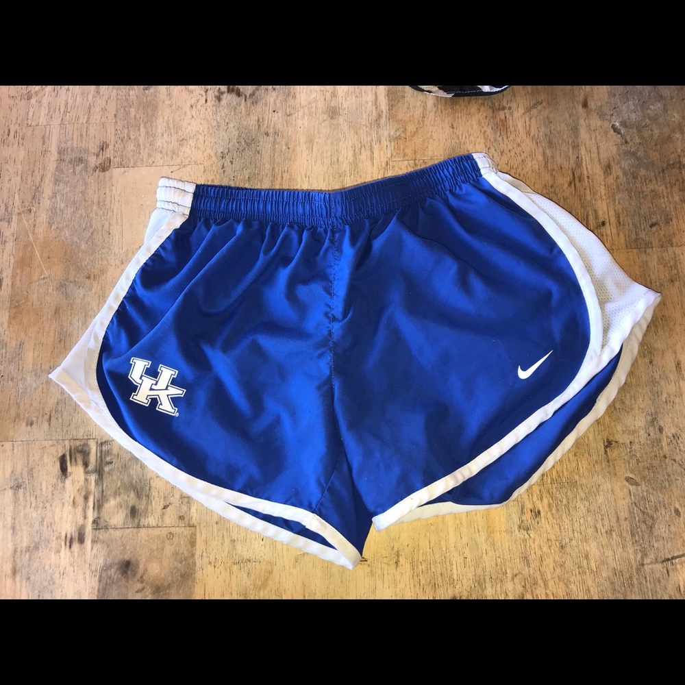 Blue Nike shorts with UK logo